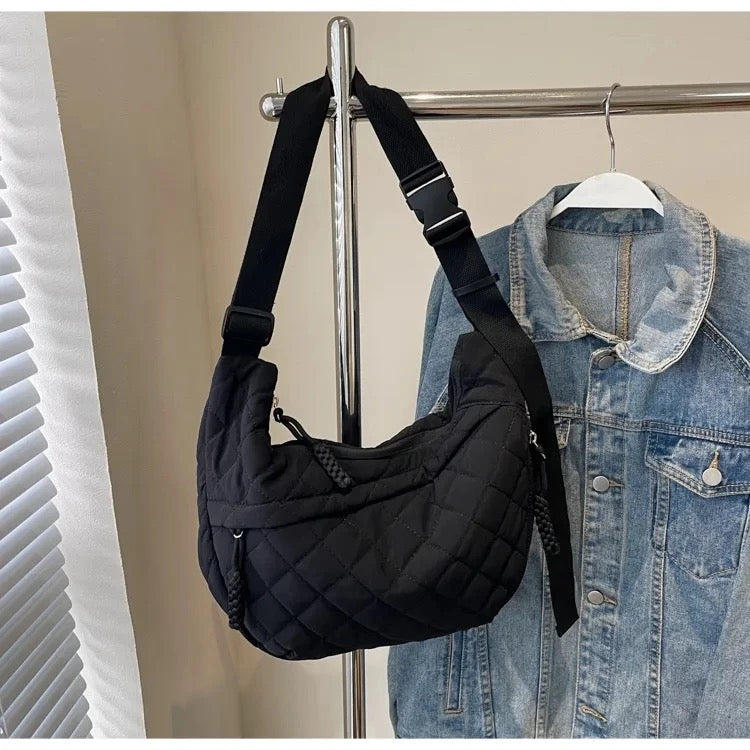 A crossbody dumpling bag Shoulder Bags
