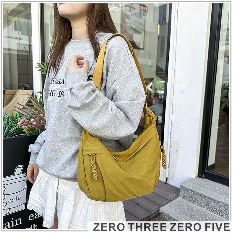 A crossbody dumpling bag Shoulder Bags