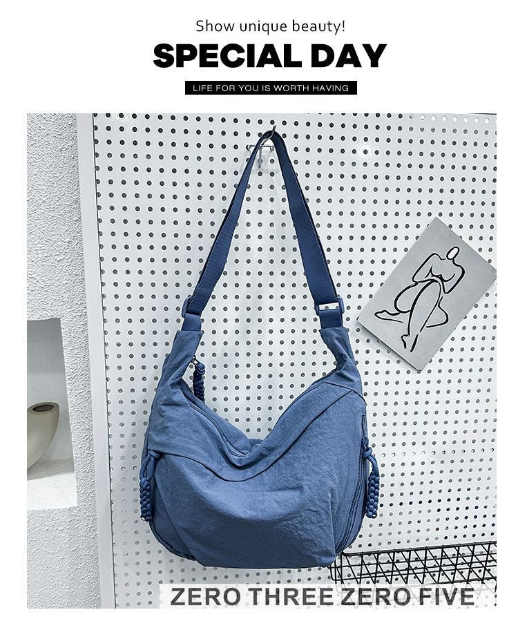 A crossbody dumpling bag Shoulder Bags