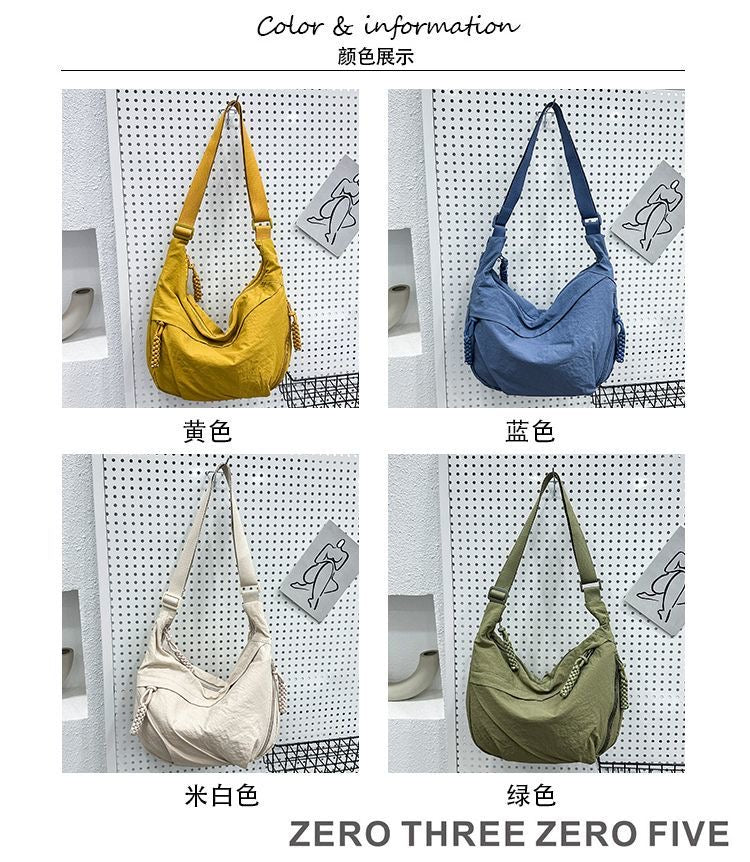 A crossbody dumpling bag Shoulder Bags