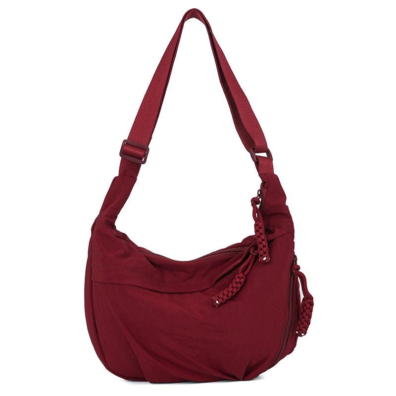 A crossbody dumpling bag Shoulder Bags