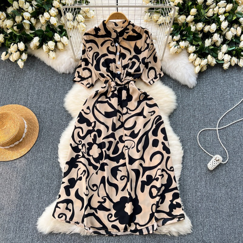 Niche design sense printed dress women's 2025 new summer dress space-up waist thin medium and long holiday skirt