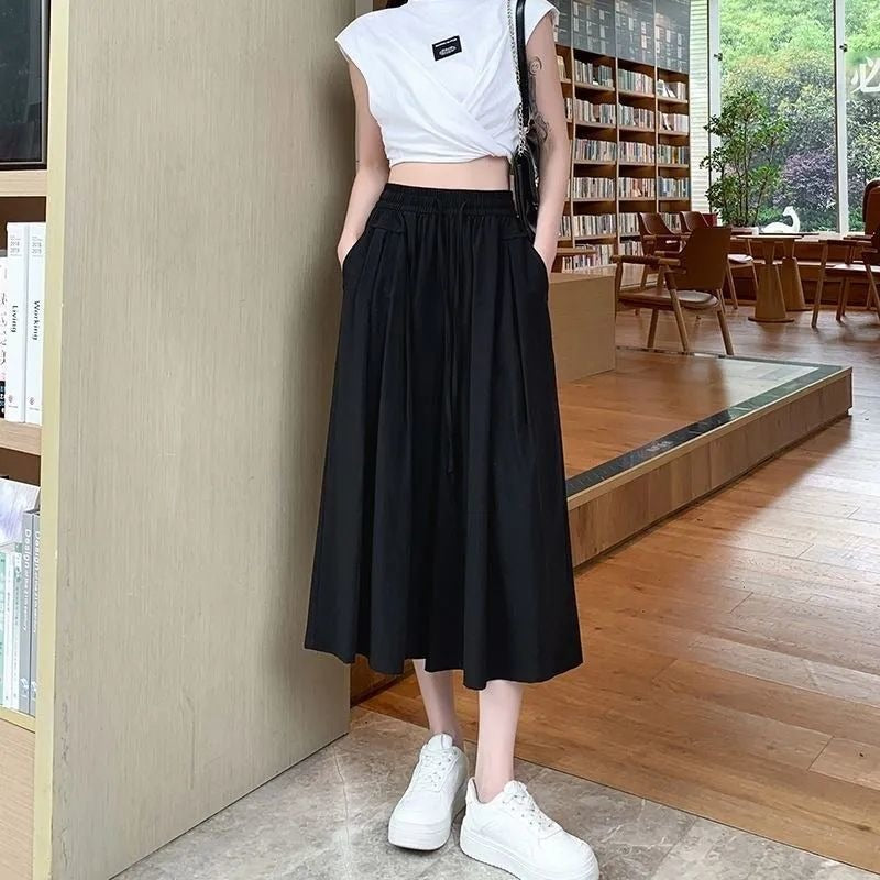 New seven-point pants skirt simple and fashionable solid color versatile loose pleated lazy wind mountain pants summer thin women's tide