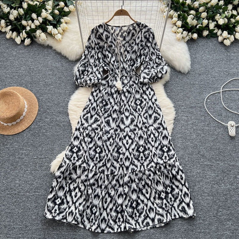 French retro bubble sleeve floral dress women's summer strap waist design sense light luxury temperament big swing dress