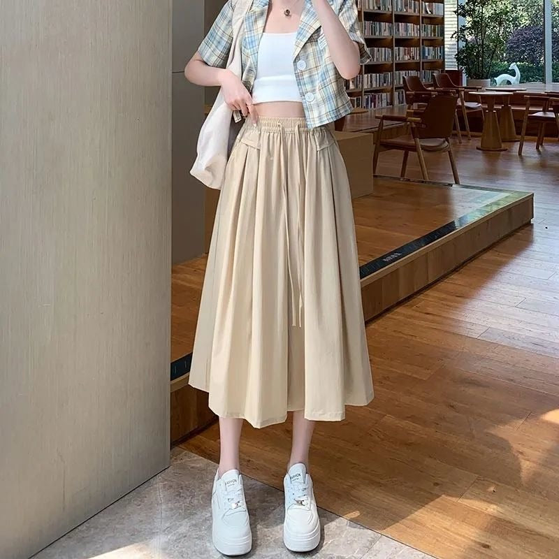 New seven-point pants skirt simple and fashionable solid color versatile loose pleated lazy wind mountain pants summer thin women's tide