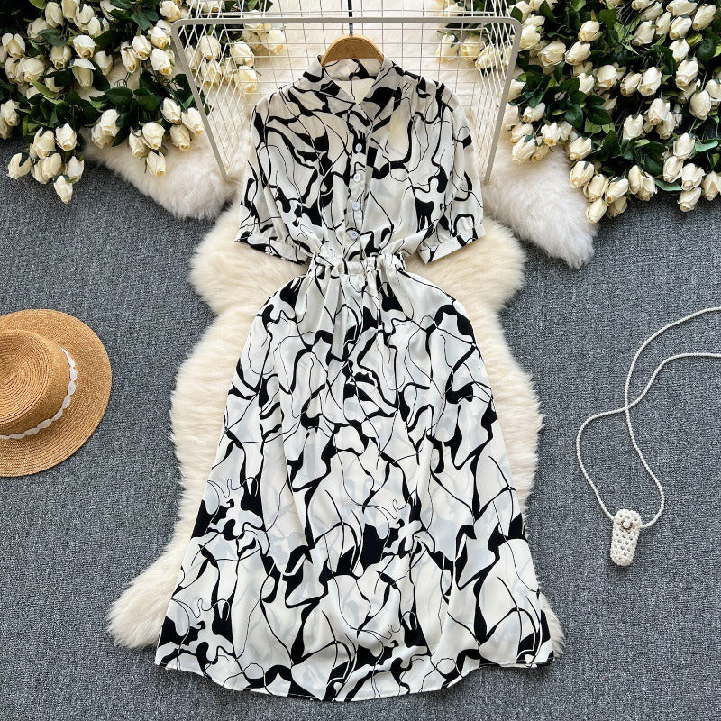 Niche design sense printed dress women's 2025 new summer dress space-up waist thin medium and long holiday skirt