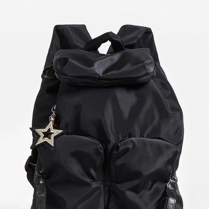 2025 new foreign trade flip drawstring large-capacity travel bag Korean version nylon cloth lightweight casual backpack women