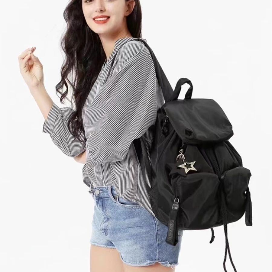 2025 new foreign trade flip drawstring large-capacity travel bag Korean version nylon cloth lightweight casual backpack women