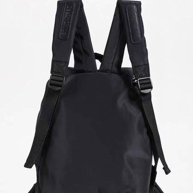 2025 new foreign trade flip drawstring large-capacity travel bag Korean version nylon cloth lightweight casual backpack women