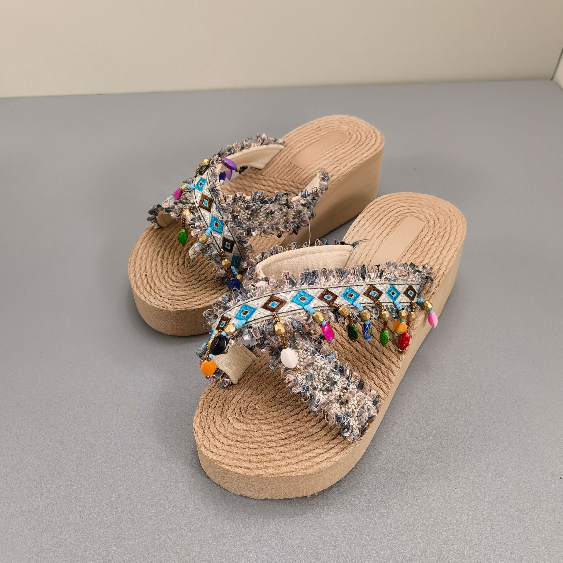 Xishuangbanna handmade slippers women's summer wear bohemian fashion fringed ethnic wind slope heels high heels beach shoes