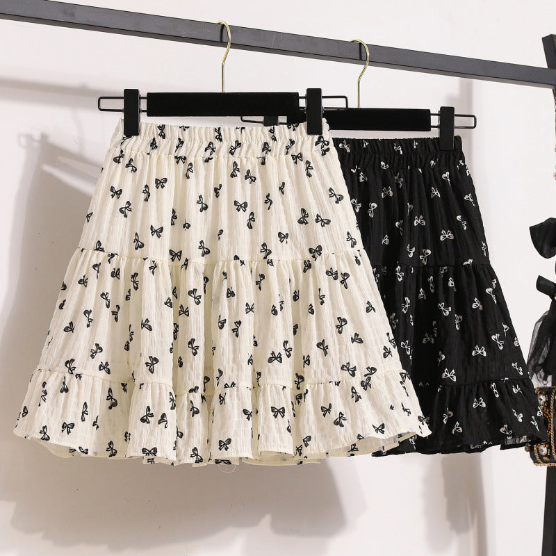 Printed bow skirt 2025 summer small skirt age reduction cute and thin cake black skirt