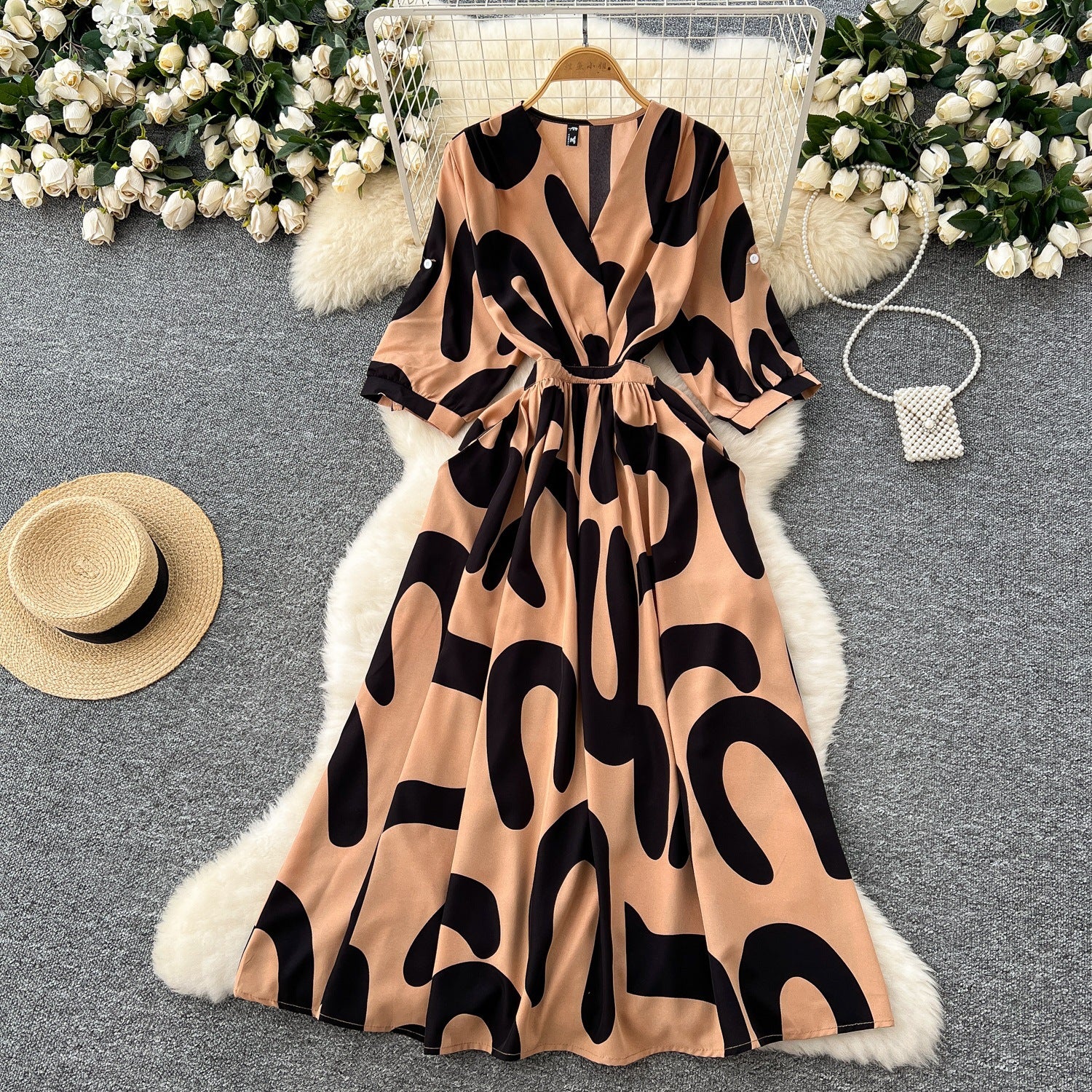 Light and mature style niche retro V-neck seven-quarter sleeve printed dress women's French waist and thin temperament A-shaped long skirt
