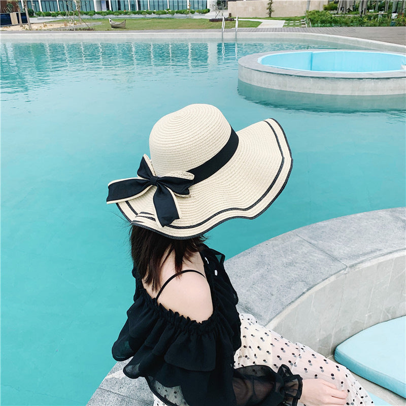 Small fresh straw hat women's anti-sun beach hat seaside sun hat Korean version travel casual sun hat bow hat