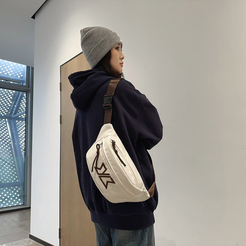 Early spring new breast bag women's messenger bag versatile couple mobile phone fanny pack large capacity trendy satchel men's single shoulder bag