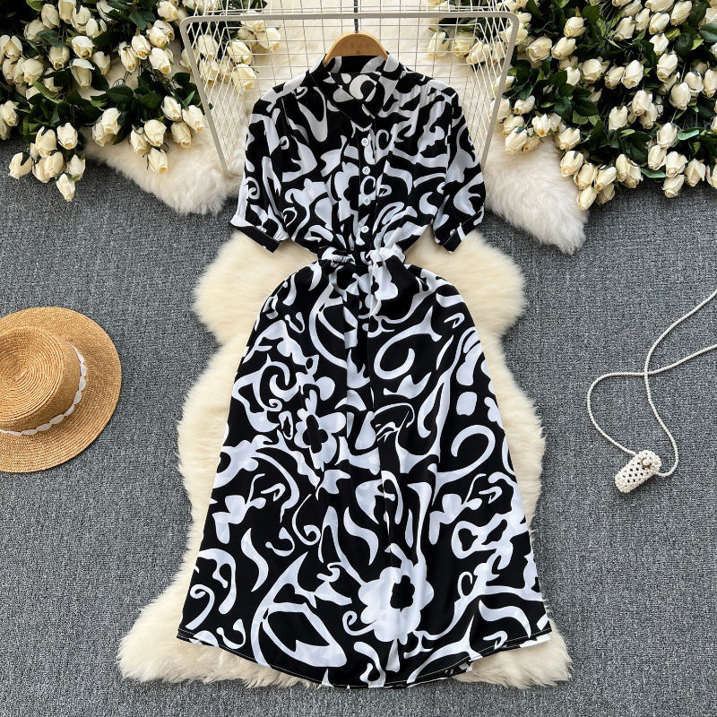 Niche design sense printed dress women's 2025 new summer dress space-up waist thin medium and long holiday skirt