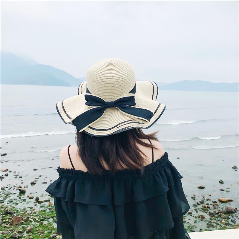 Small fresh straw hat women's anti-sun beach hat seaside sun hat Korean version travel casual sun hat bow hat