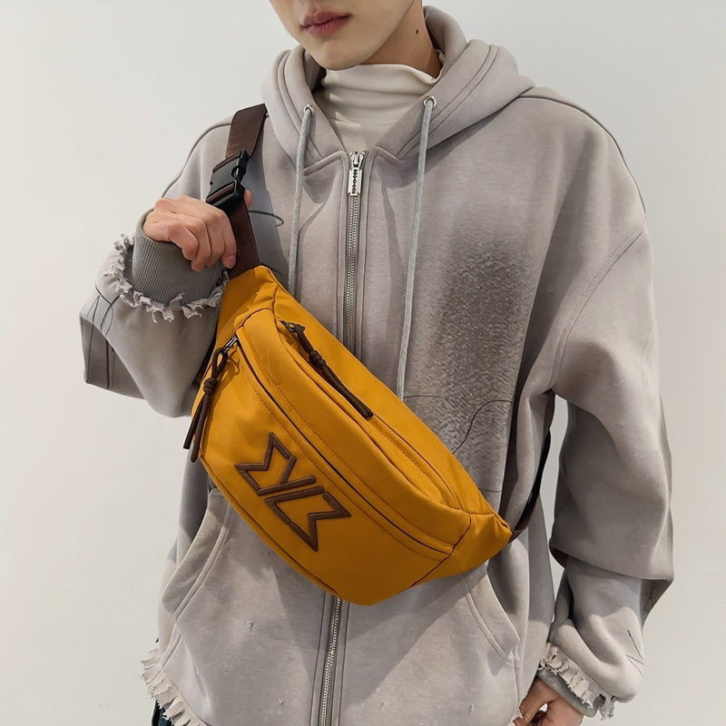 Early spring new breast bag women's messenger bag versatile couple mobile phone fanny pack large capacity trendy satchel men's single shoulder bag