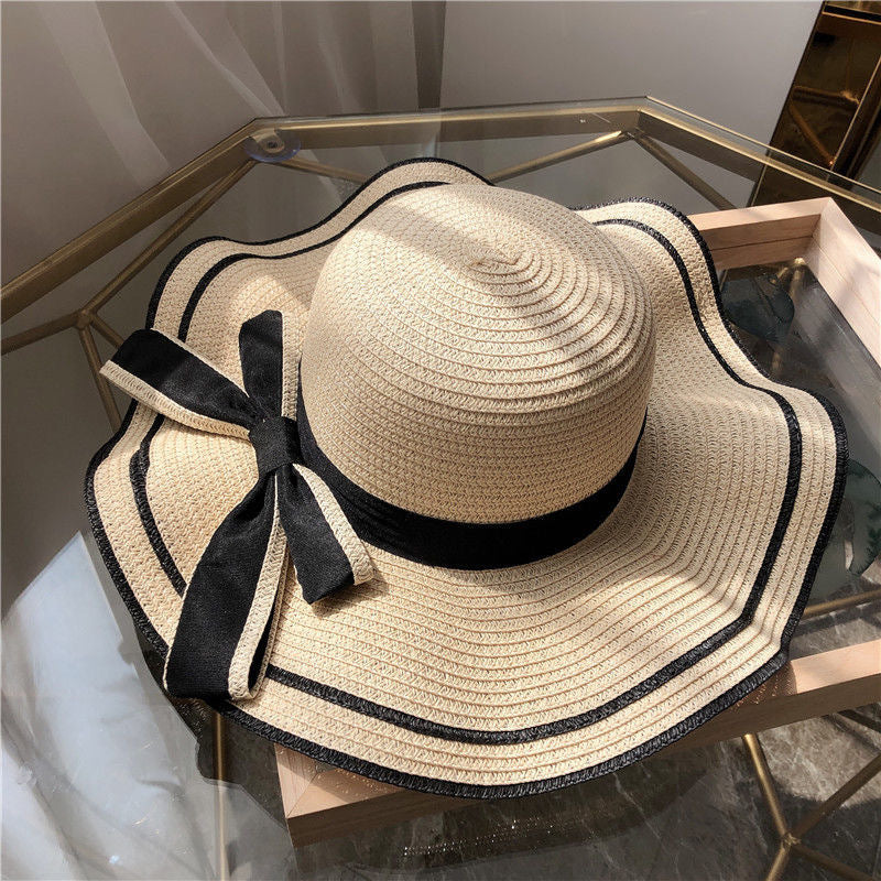 Small fresh straw hat women's anti-sun beach hat seaside sun hat Korean version travel casual sun hat bow hat