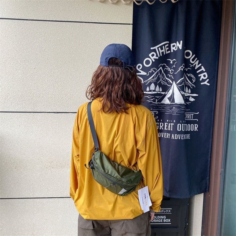 Outdoor locomotive waterproof DuPont plaid nylon fanny pack strap breast bag Internet celebrity super handsome