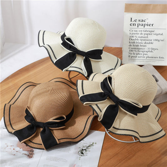 Small fresh straw hat women's anti-sun beach hat seaside sun hat Korean version travel casual sun hat bow hat