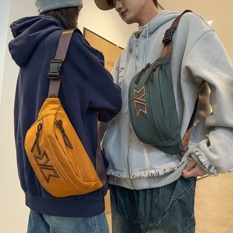 Early spring new breast bag women's messenger bag versatile couple mobile phone fanny pack large capacity trendy satchel men's single shoulder bag