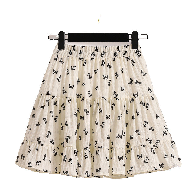 Printed bow skirt 2025 summer small skirt age reduction cute and thin cake black skirt