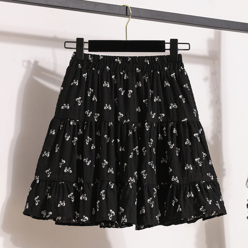 Printed bow skirt 2025 summer small skirt age reduction cute and thin cake black skirt