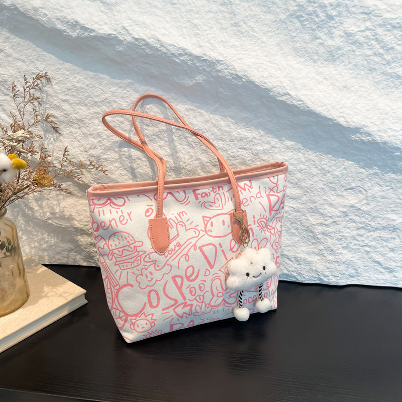 Graffiti canvas bag women's 2025 new casual shoulder bag versatile large-capacity student class commute tote bag