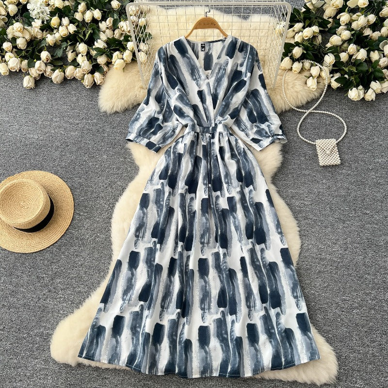 Light and mature style niche retro V-neck seven-quarter sleeve printed dress women's French waist and thin temperament A-shaped long skirt