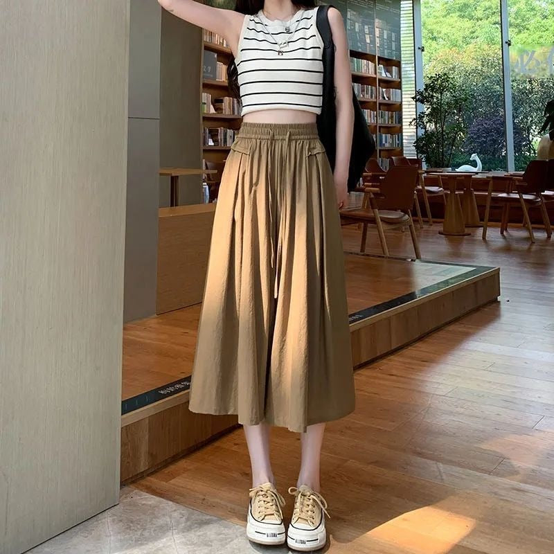 New seven-point pants skirt simple and fashionable solid color versatile loose pleated lazy wind mountain pants summer thin women's tide