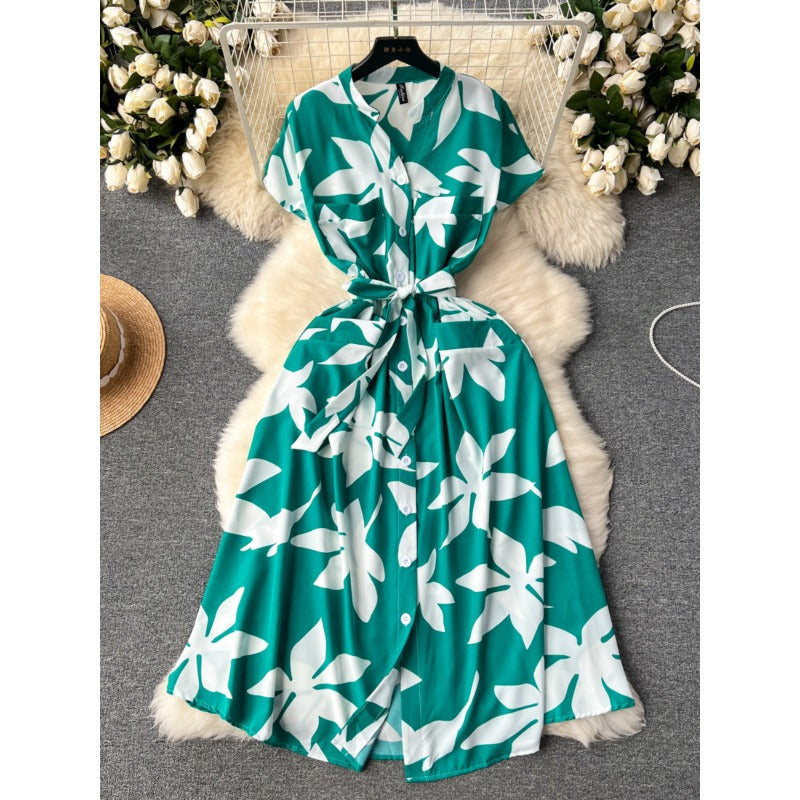 European and American style holiday dress women's 2025 new design sense printing strap waist thin medium and long knee skirt
