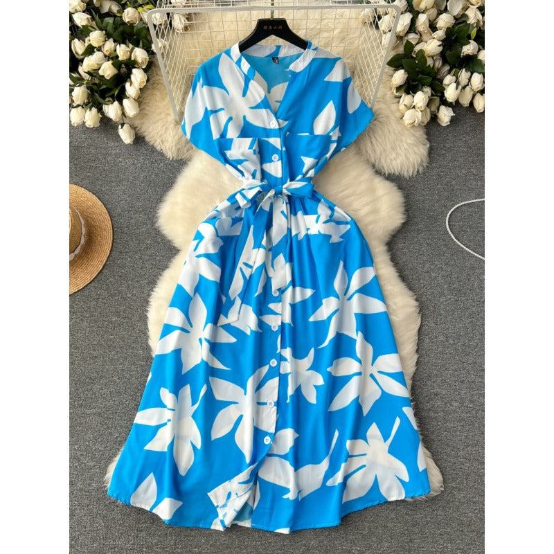 European and American style holiday dress women's 2025 new design sense printing strap waist thin medium and long knee skirt