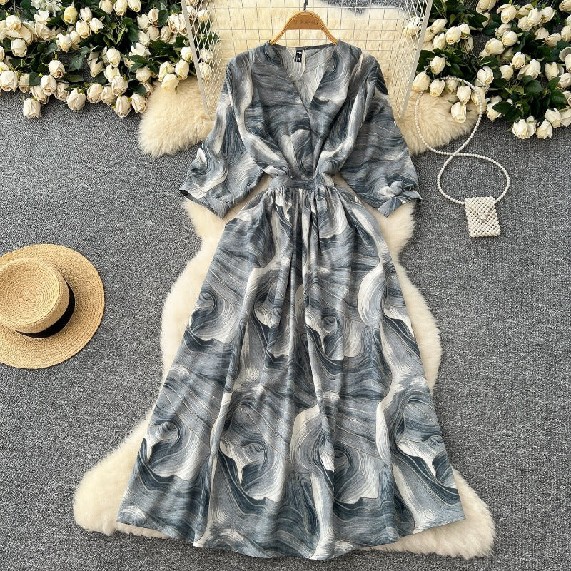 Light and mature style niche retro V-neck seven-quarter sleeve printed dress women's French waist and thin temperament A-shaped long skirt